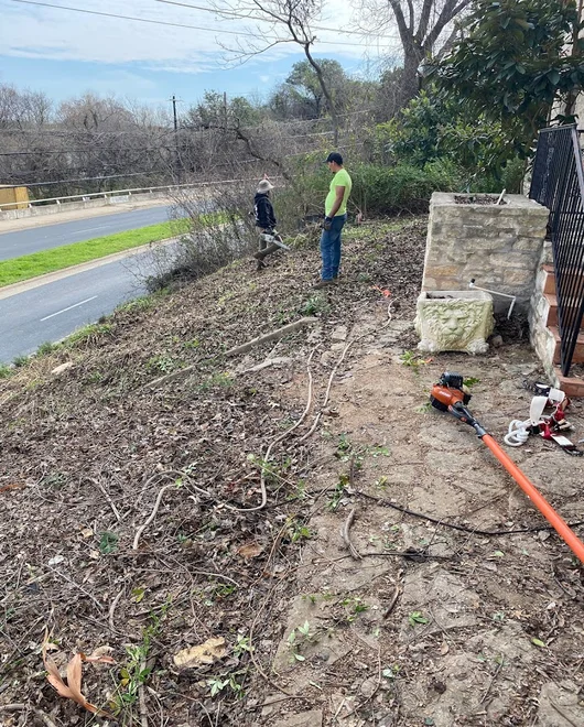 Team members working on line clearing in Lakeway, TX