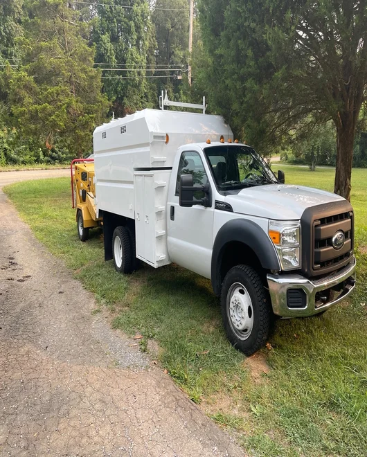 A truck after a stump grinding in Lakeway, TX